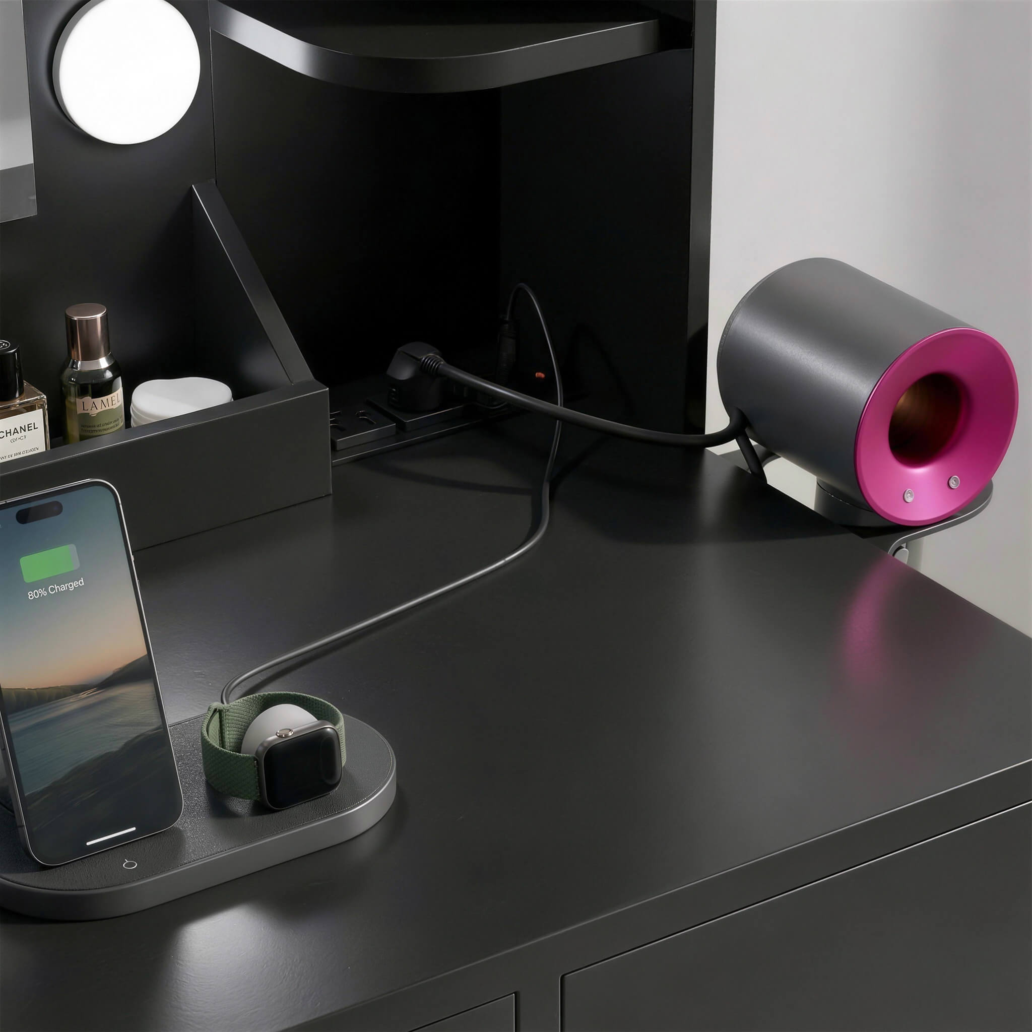 Woman styling hair at Black Treevan Aura Plus Vanity featuring built-in power outlets and USB ports.