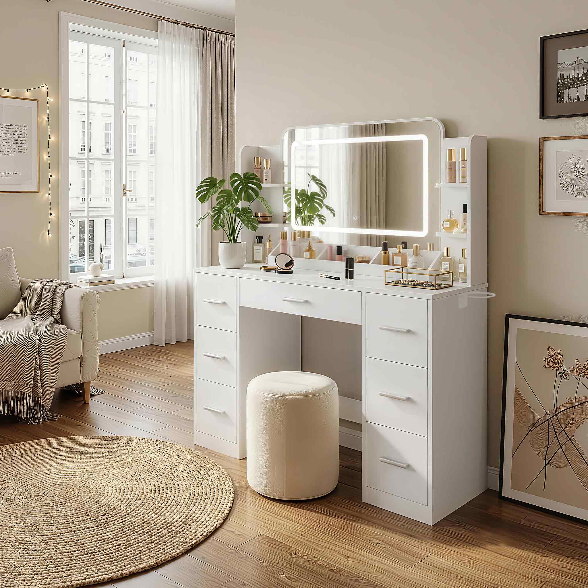 White Treevan Aura Studio Vanity set with LED mirror placed in a modern bedroom setting.
