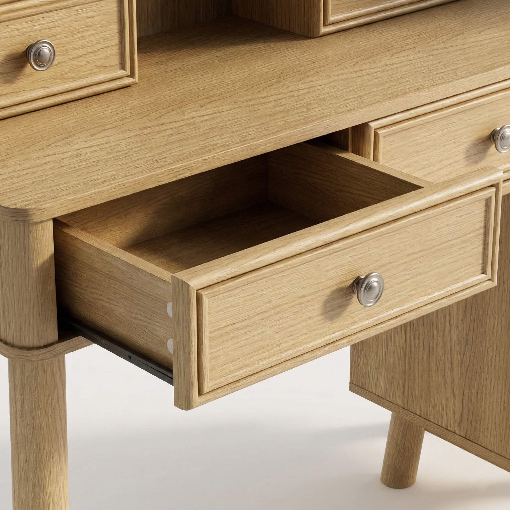 Open drawer of the Oak Treevan Gallery Grand vanity showcasing smooth glides and spacious wood-textured storage.
