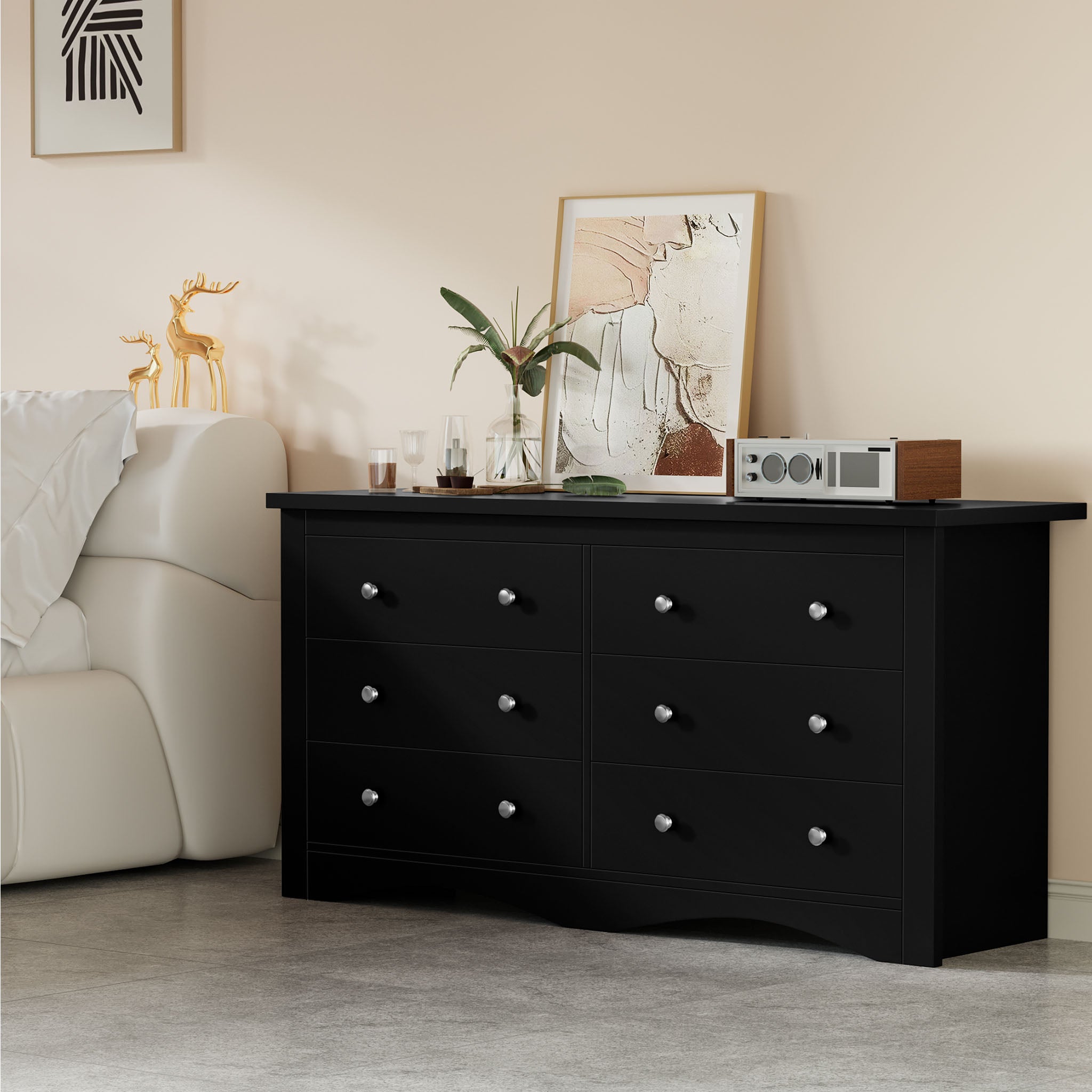 Black Treevan Hestia 6-drawer double dresser styled in a cozy living room space with modern decor.#color_black