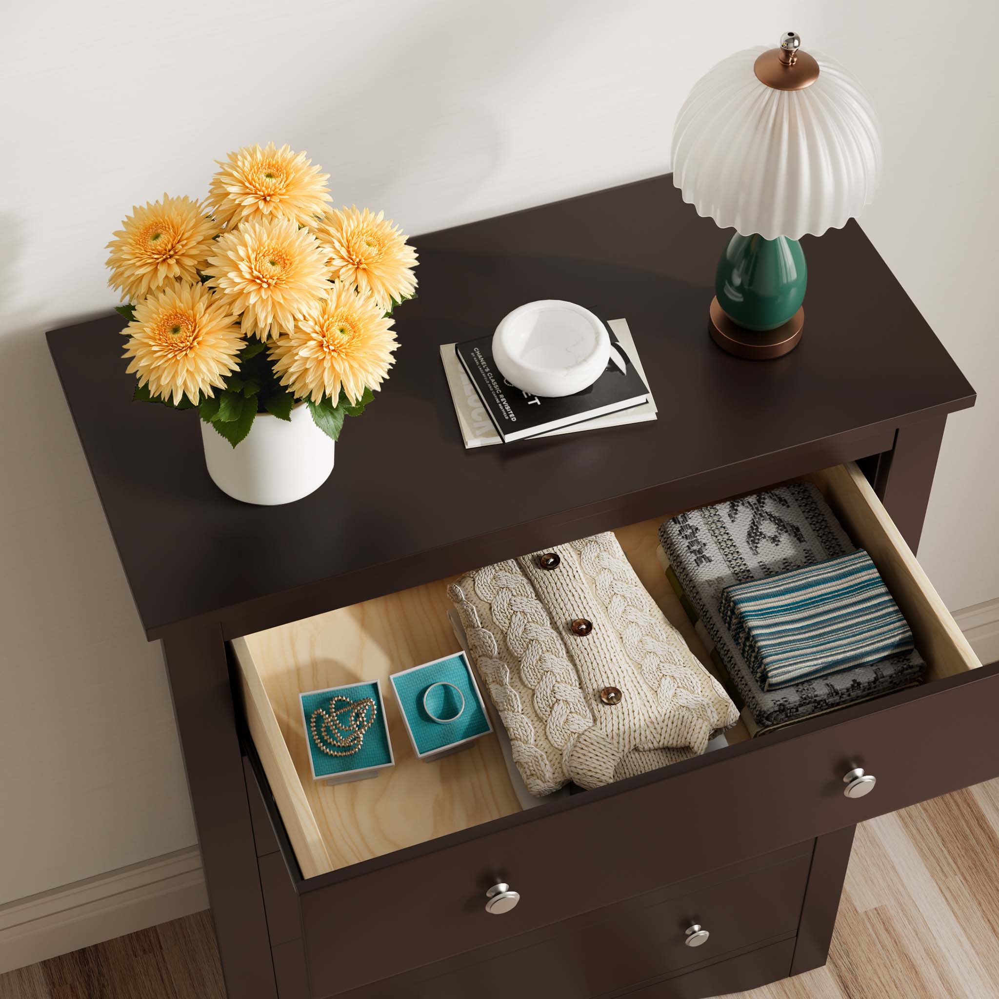 Top view of an open drawer in the Brown Treevan Hestia tall chest showing spacious storage for clothes and accessories.