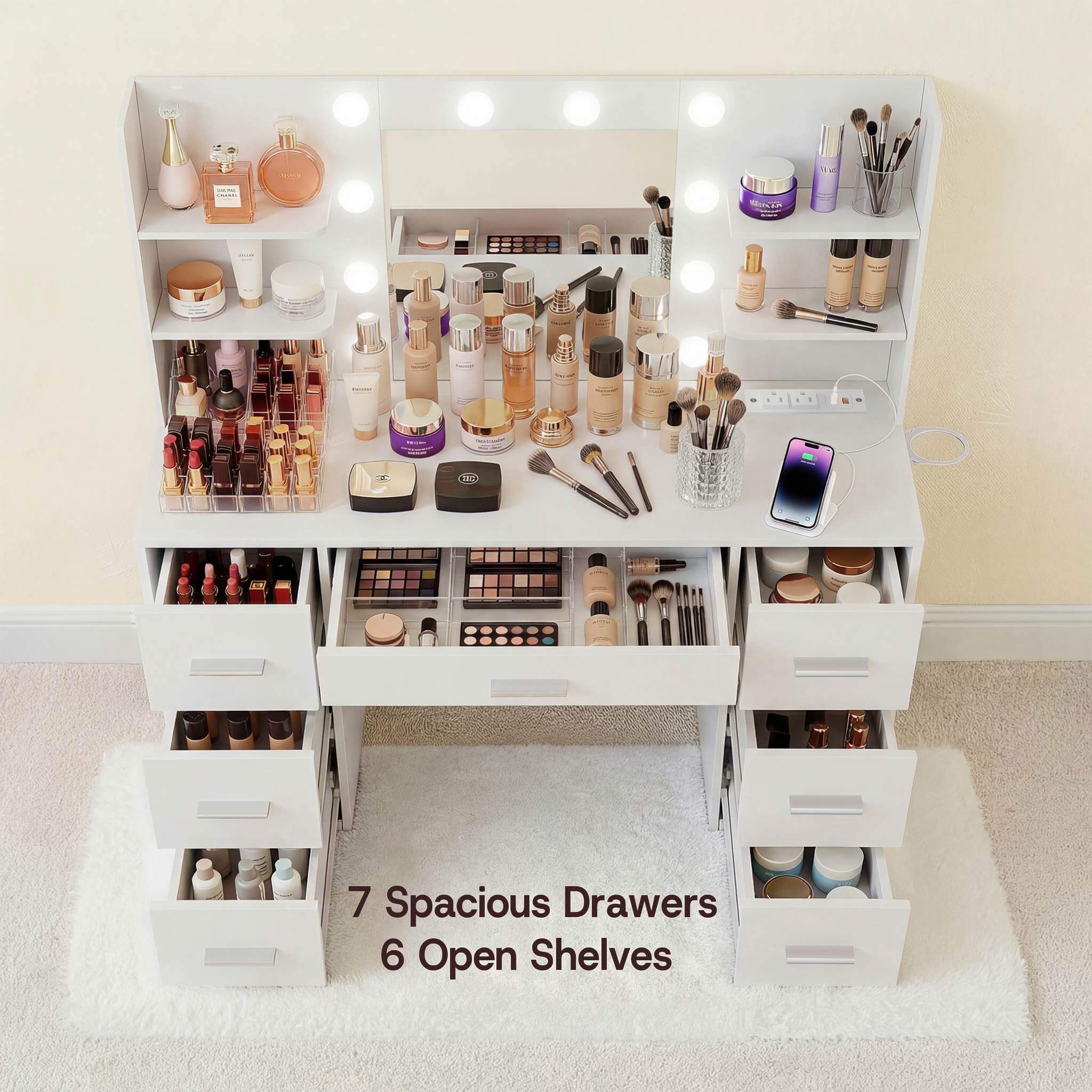 White Treevan large makeup desk featuring 7 spacious drawers and 6 open shelves.