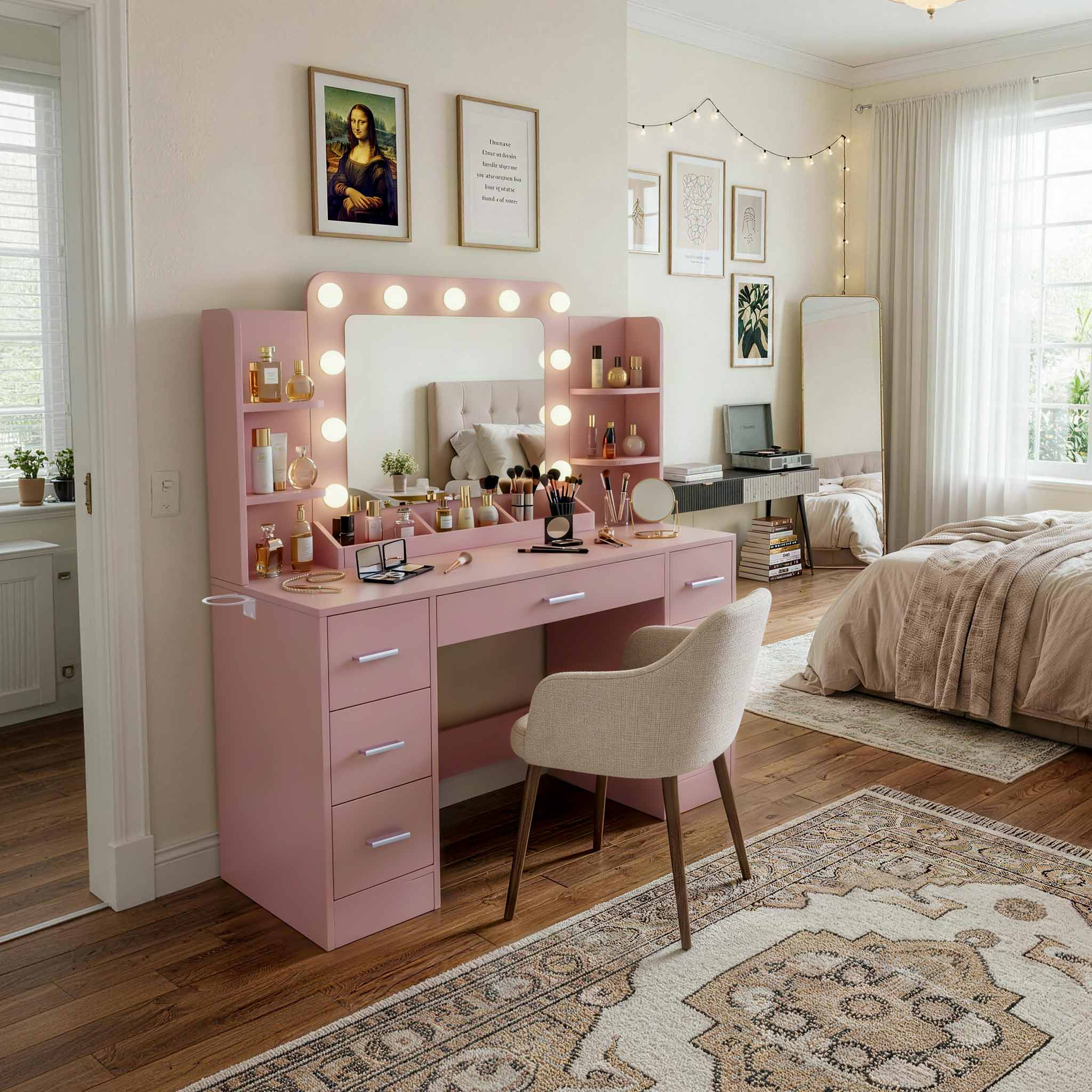 Light Pink Treevan Aura Plus Vanity set with Hollywood lights placed in a modern bedroom setting.
