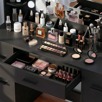 Close-up of Black Treevan Aura Plus Vanity desktop storage rack organized with perfumes and cosmetics.