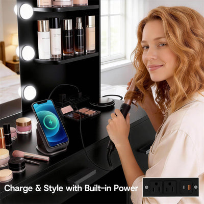 Woman styling hair at Black Treevan Aura Vanity desk featuring a built-in power strip and wireless charging station.