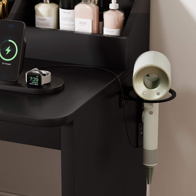 Black Treevan Corner Studio vanity table being used as a home office desk with laptop and coffee.