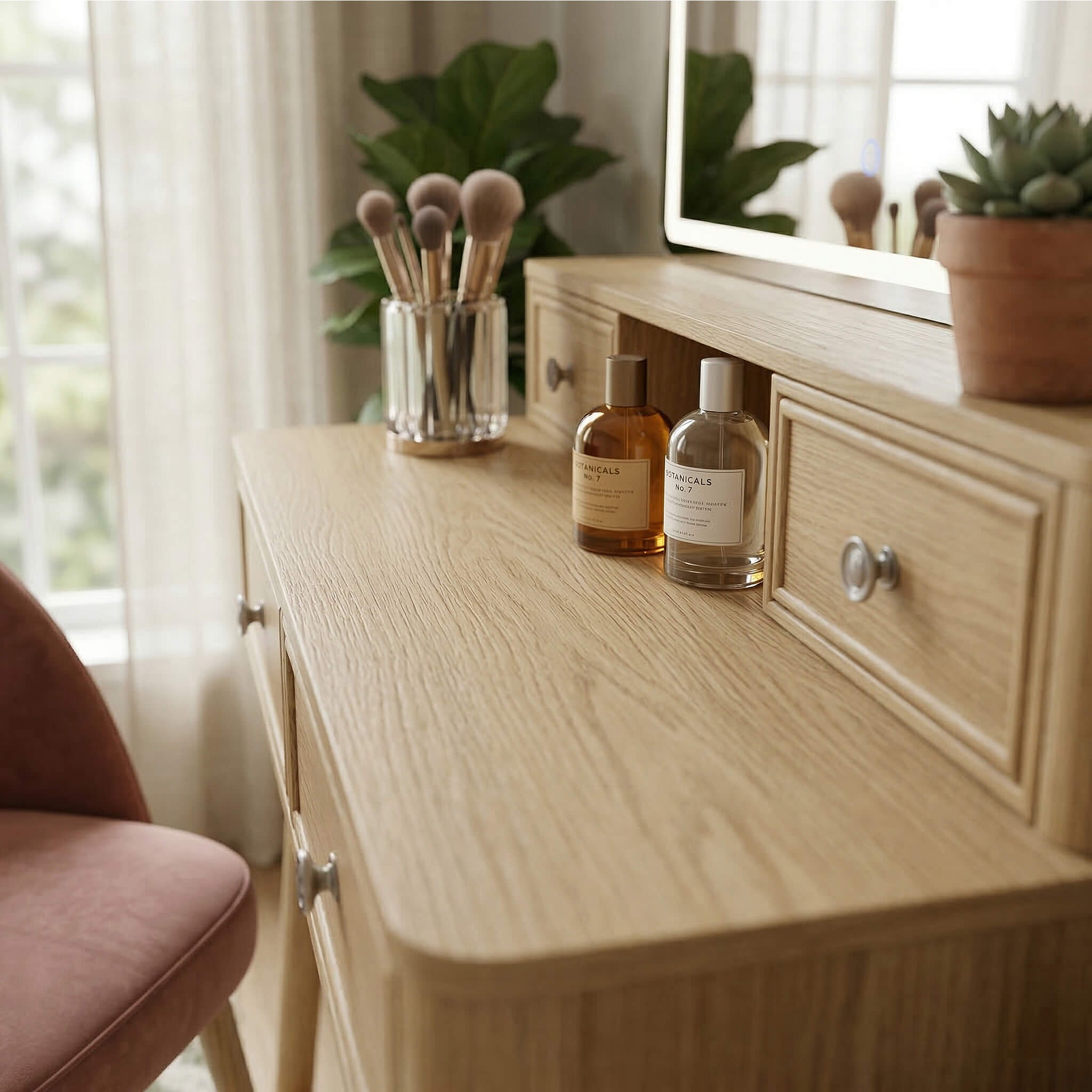 Close-up of the Oak Treevan Gallery Grand vanity desktop featuring small organizing drawers and perfume display space.