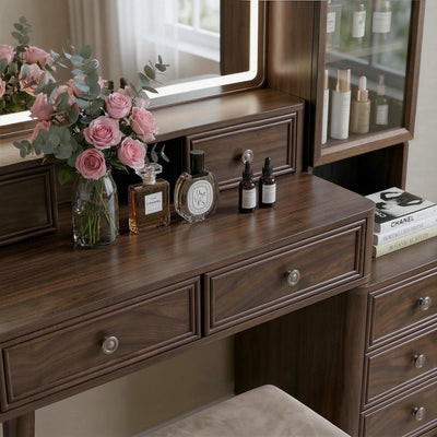 Close-up of the Walnut Treevan Gallery Grand vanity desktop featuring small organizing drawers and perfume display space.