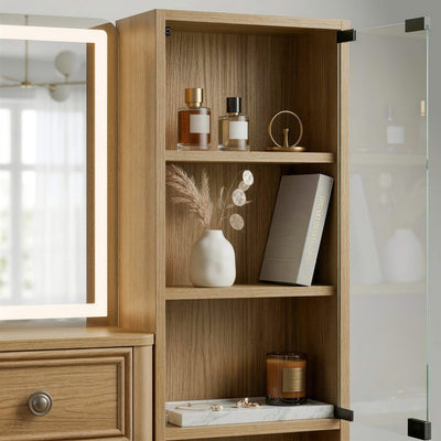 Close-up interior view of the Oak Treevan Gallery Grand vanity display cabinet featuring a premium tempered glass door and spacious shelves organized with perfumes and decor.