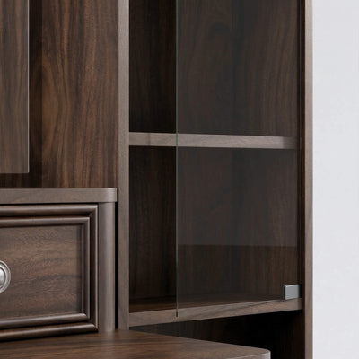 Close-up of the premium tempered glass cabinet door with sleek hardware on the Walnut Treevan Gallery Grand vanity.