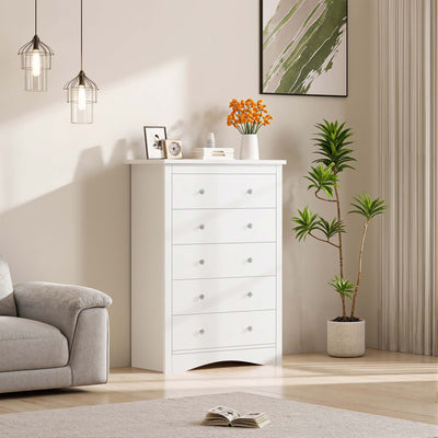 White Treevan Hestia 5-drawer tall chest placed in a bright and cozy room setting.
