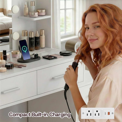 Woman styling hair at White Treevan Muse Suite Vanity desk featuring built-in power outlets and USB ports.