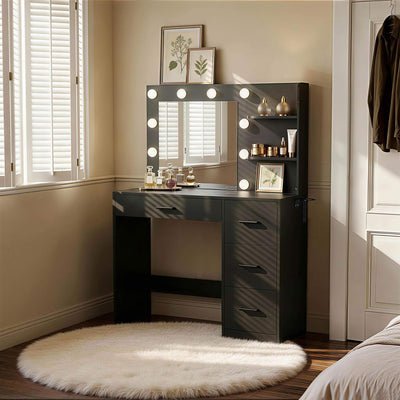 Black Treevan Muse Tower Vanity set with Hollywood lights placed in a compact cozy bedroom setting.
