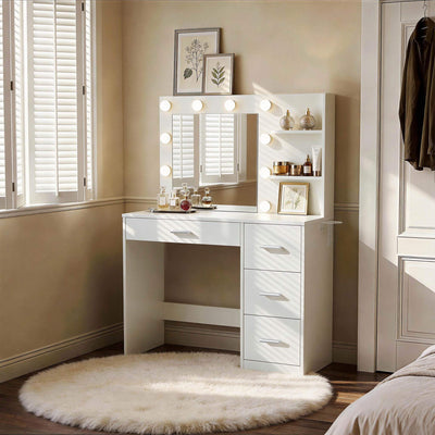 White Treevan Muse Tower Vanity set with Hollywood lights placed in a compact cozy bedroom setting.